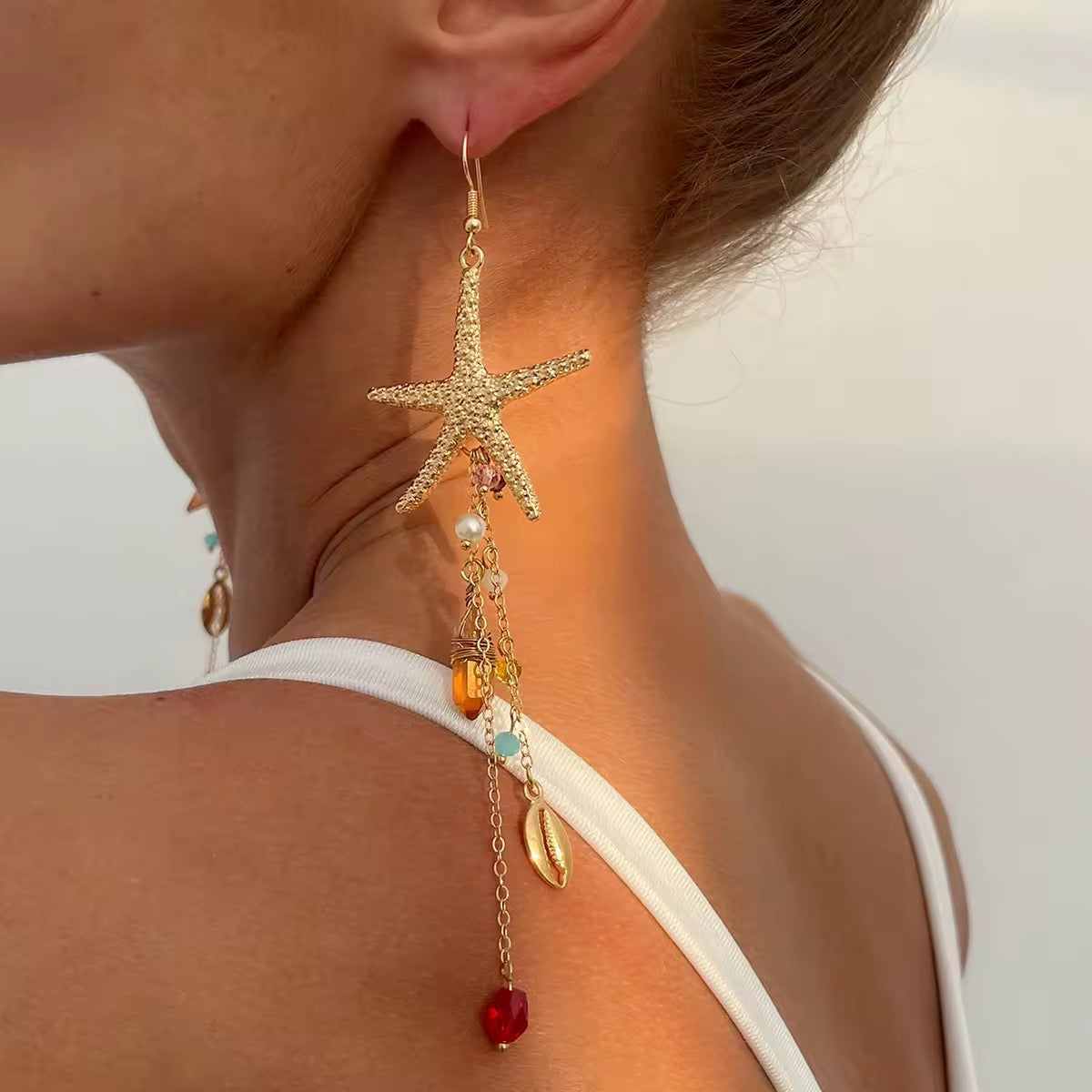 Golden Starfish Dreams – Handmade statement earrings with shell & glass beads