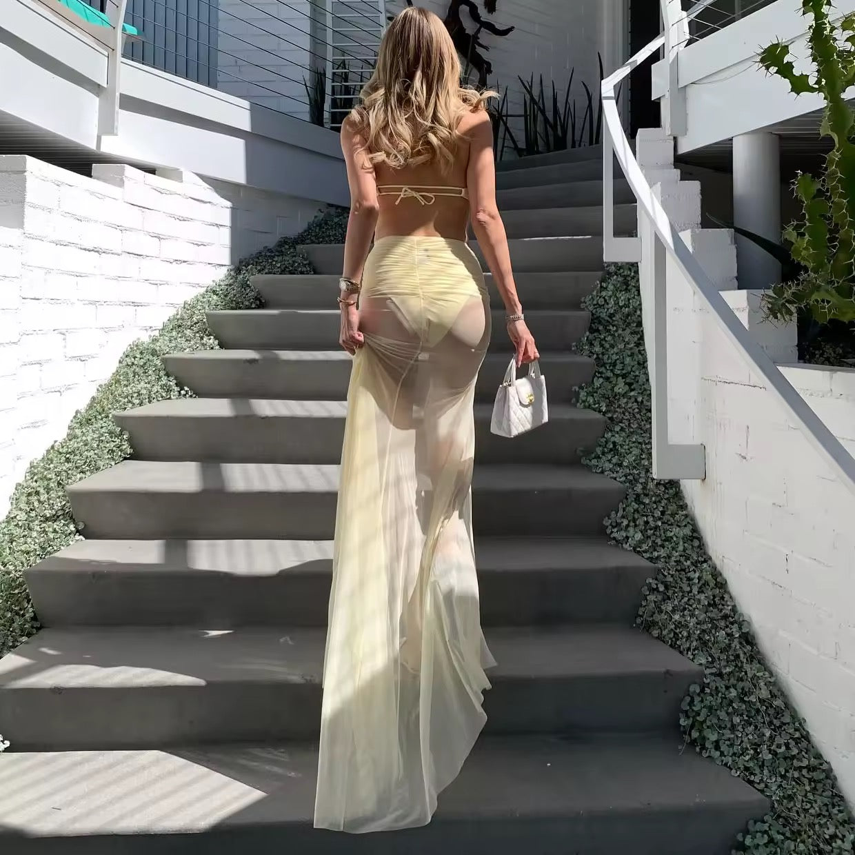 3-piece bikini set in soft yellow with wrap skirt