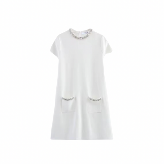 White mini dress with decorative trim